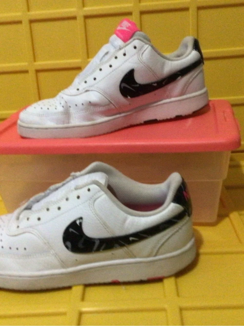 Nike White Kids Sneakers with Black Swoosh and Pink Tongue Accent